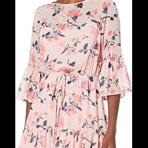 Floral print long sleeved off the shoulder A-line dress with bell sleeves.